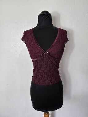 Just Polly Wine Lace V-Neck Cap Sleeve Top.